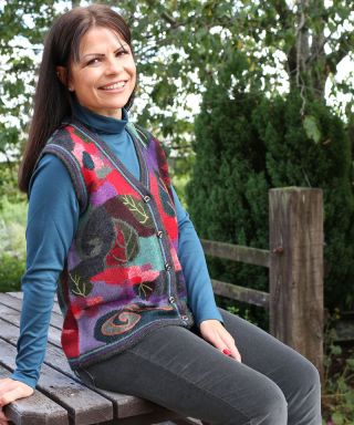 Women's hand-crafted alpaca waistcoat in a floral leaf design in berri tones