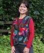 Women's handmade alpaca waistcoat in a floral design of reds, purples and greens